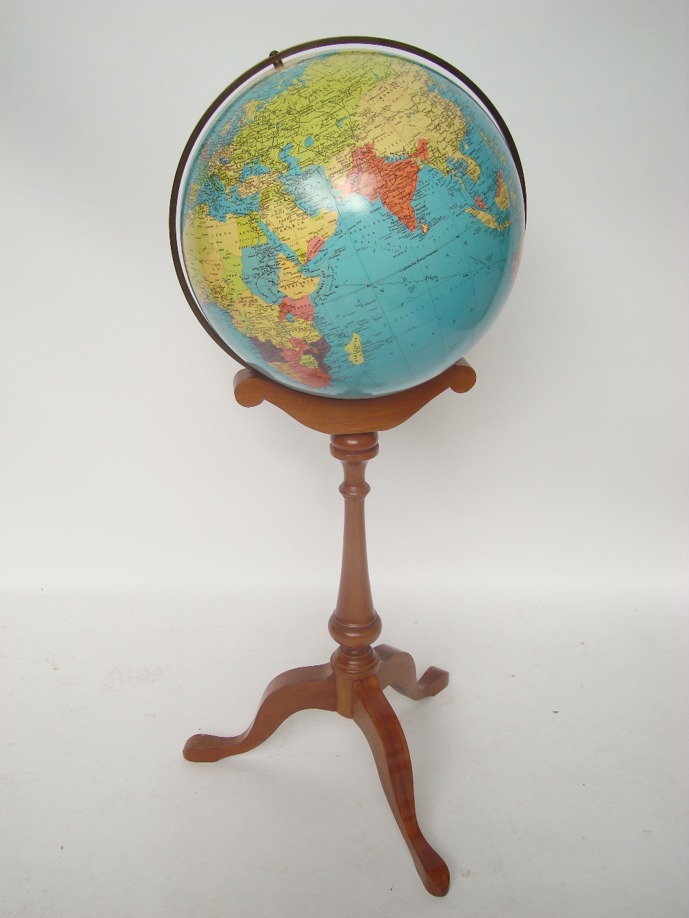 Philip's Terrestrial Globe on tripod base.