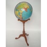 Philip's Terrestrial Globe on tripod base.