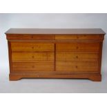 A French Grange furniture cherry wood chest of drawers.