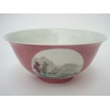 A Chinese porcelain pink ground bowl, sgraffito decorated,