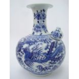 A large Chinese blue and white porcelain Kendi, of globular form with flared neck,
