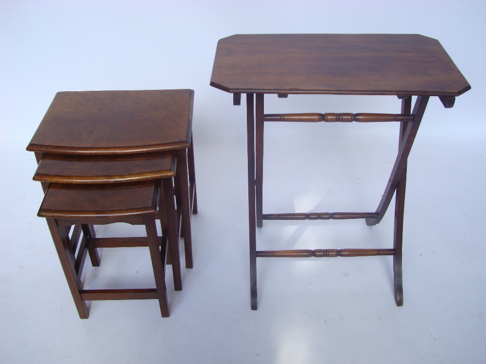 A burr walnut trio of nesting tables together with an Edwardian folding table (2).