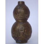 A Chinese brass double gourd vase.
16cm high.