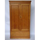 A Victorian pine wardrobe,