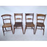 A pair of 19th Century fruitwood and beech kitchen chairs with elm seats,