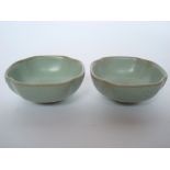A pair of Chinese celadon crackle glazed porcelain brush washers, of square lobed form, 7cm wide.