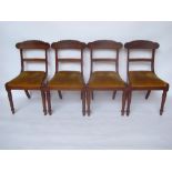 A set of four George IV mahogany dining chairs,