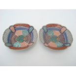 A pair of Japanese late Edo period Arita polychrome decorated square dishes,
