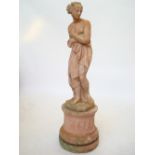 A reconstituted stone garden statue of a semi clad classical goddess after the antique,