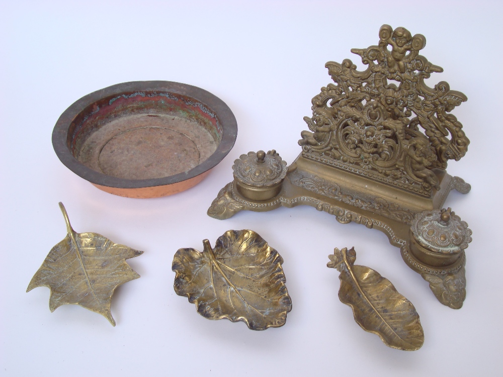 An early 20th Century case brass letter rack and inkwell together with three VCM Virginia