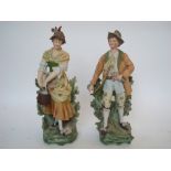 A pair of late 19th Century French large bisque porcelain figures,