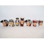 Royal Doulton character jugs.