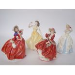 Royal Doulton figures 'Top O' The Hill' HN1834, Autumn Breezes HN1934, Madeline HN4152 and Laura H.
