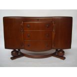 A 1940's Beautility oak sideboard.