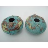 A pair of Chinese polychrome glazed water pots,