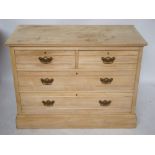 An Edwardian pine bleached satinwood chest of drawers,