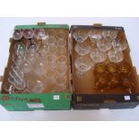 A set of nine cut glass champagne coupes, a set of twelve German Jena Glas punch cups,