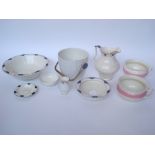 An Art Nouveau pottery wash set comprising washbowl (riveted), wash jug, slop bucket,