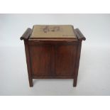 Early 20th Century walnut box piano stool with hinged tapestry covered seat.