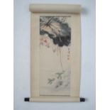 A Chinese hanging scroll painting, lotus blossom amongst foliage with swimming frogs, signed,