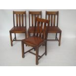 A set of four 1930's oak dining chairs with drop in seats.