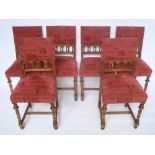 A set of six Flemish walnut dining chairs, each with upholstered backs and seats,