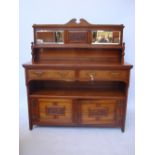 A late Victorian aesthetic movement walnut sideboard,