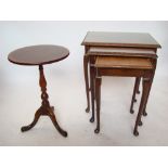 A reproduction mahogany nesting trio of occasional tables and a reproduction low tripod table (2).