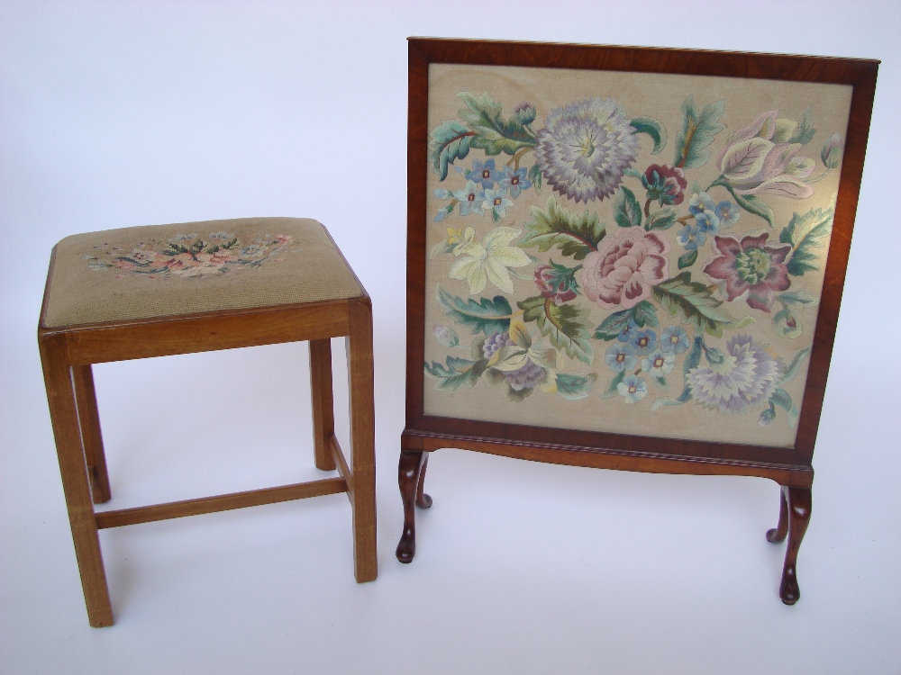 A George III style mahogany stool with drop in tapestry seat,