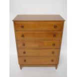 Mid 20th Century Canadian maple chest of drawers with five graduated long drawers.