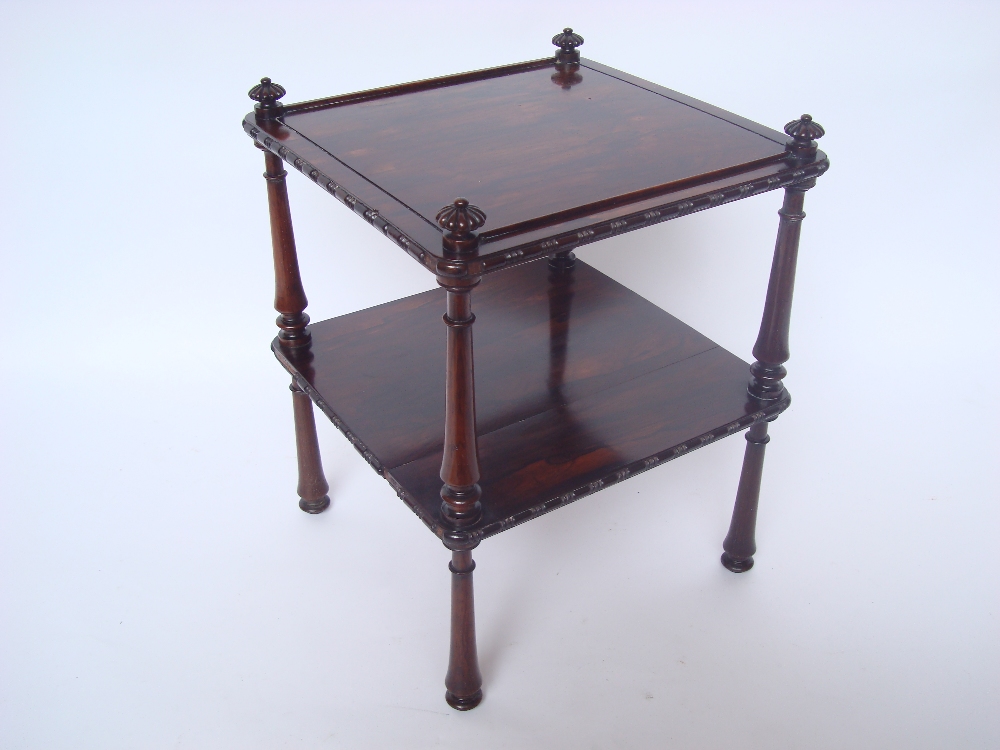 An early 19th Century square rosewood whatnot, with two tiers on turned supports.