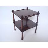 An early 19th Century square rosewood whatnot, with two tiers on turned supports.