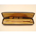 A 9ct gold Yard o Led propelling pencil, engine turned decoration, in original box.
