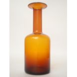 A mid 20th Century Holmegaard amber Gu lvase designed by Otto Brauer, 30cm high.