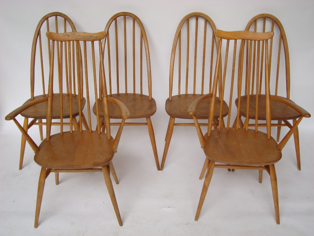 A set of four Ercol hoop spindle back and elm kitchen side chairs together with a similar pair of