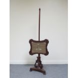 A William IV mahogany pole screen with tapestry panel