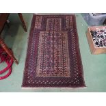 An early to mid 20th Century hand woven prayer rug rusts and blue ground, 142 x 83 cm