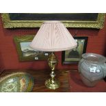 A pair of brass table lamps with pink pleated shades, 48cm tall