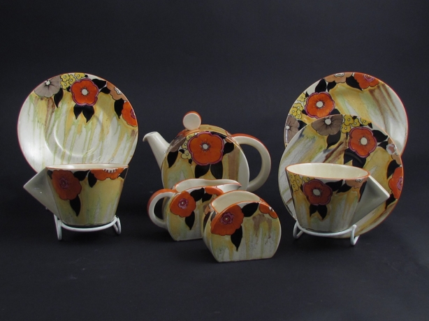 A Clarice Cliff Bonjour shape Lydiat pattern tea set for two consisting teapot, milk jug, sugar