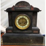 A late Victorian slate and marble mantel clock, circular enamelled Arabic dial, with central brass