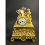 A 19th Century French gilt on bronze figural clock, Roman numerated dial with 8 day movement