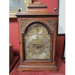 A George III walnut bracket clock, silvered Roman numerated chapter ring with calendar aperture and