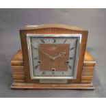 An oak cased mantel clock, Smiths Enfield, with presentation plaque, three train 8 day movement