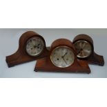 Three Napoleon hat mantel clocks