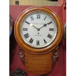 A Victorian oak cased drop dial wall clock - Satorini Bradford, Roman numerated dial, 8 day fusee