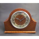 A 1930'/40's oak cased Westminster chime mantel clock (key and pendulum)