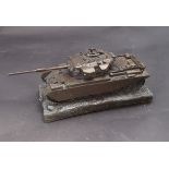 A bronzed resin Centurion Mk IV tank model