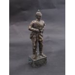 A bronzed resin figure of WWI German soldier