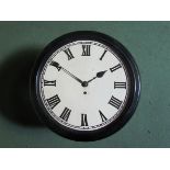 A cast iron cased dial clock, Roman 12" cast iron dial, patent no.