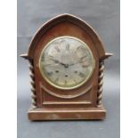 An oak cased mantel clock of lancet form for restoration